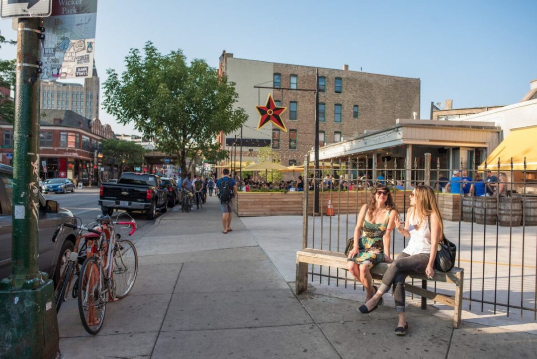 Young women wait outside the famous Big Star restaurant in Wicker Park, Chicago