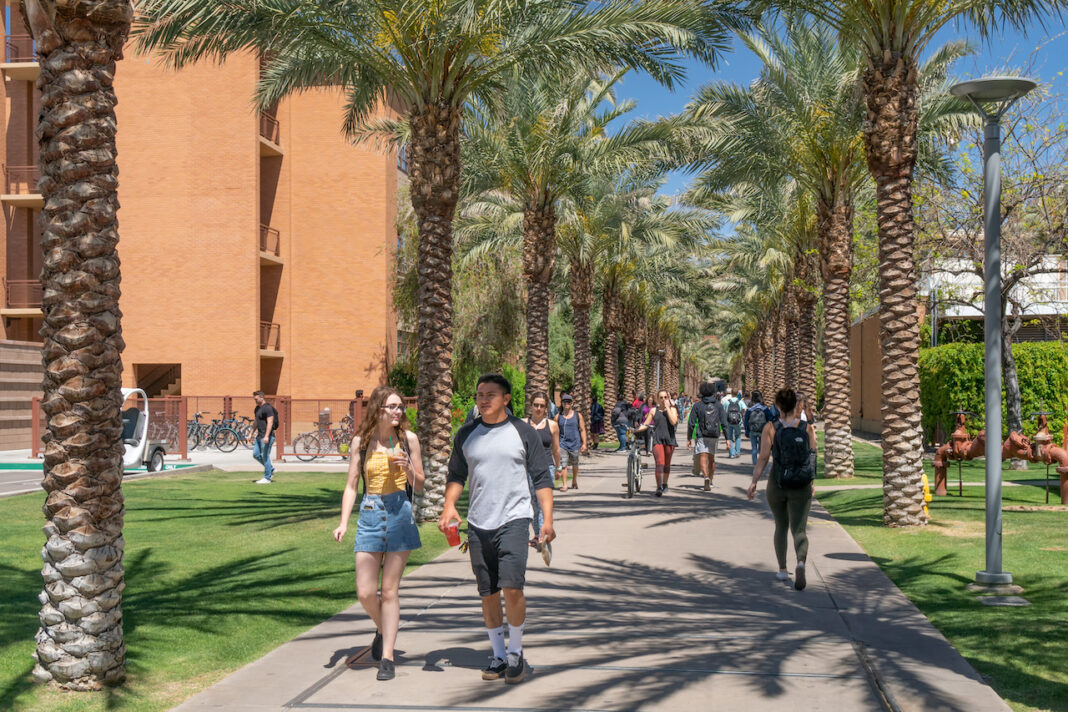students walking through ASU campus