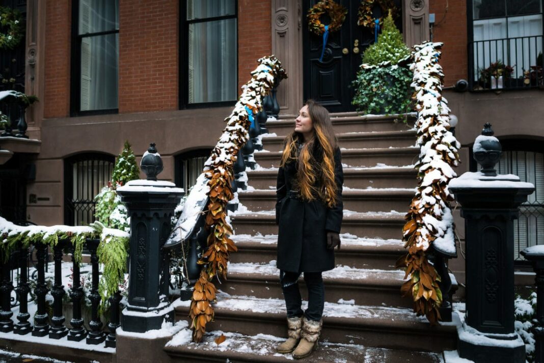 Young woman on a frosty winter Christmas morning
