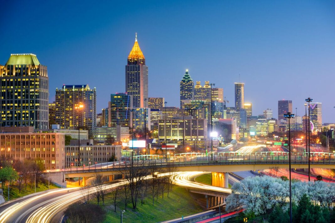 Long exposure of Atlanta skyline with car headlights