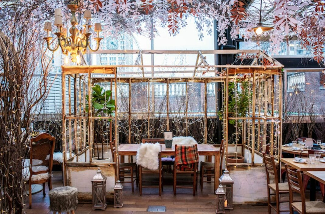 Festive winter seating at indoor rooftop bar