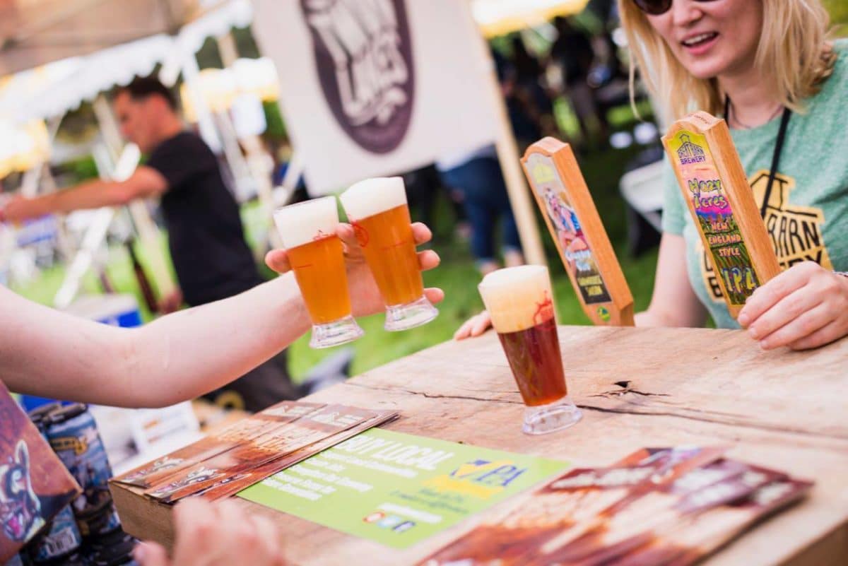 philly beer event with people receiving pints of beer