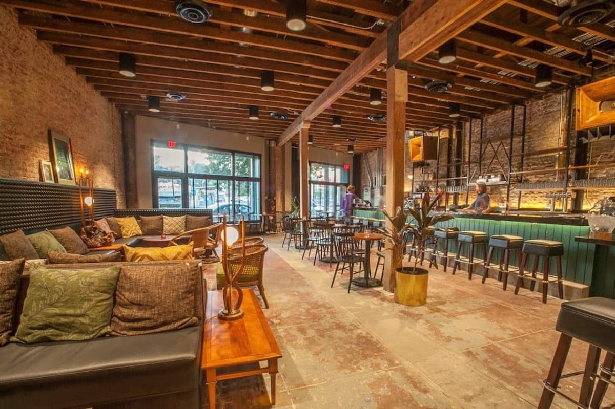 inside of bar/coffee shop with many empty seats