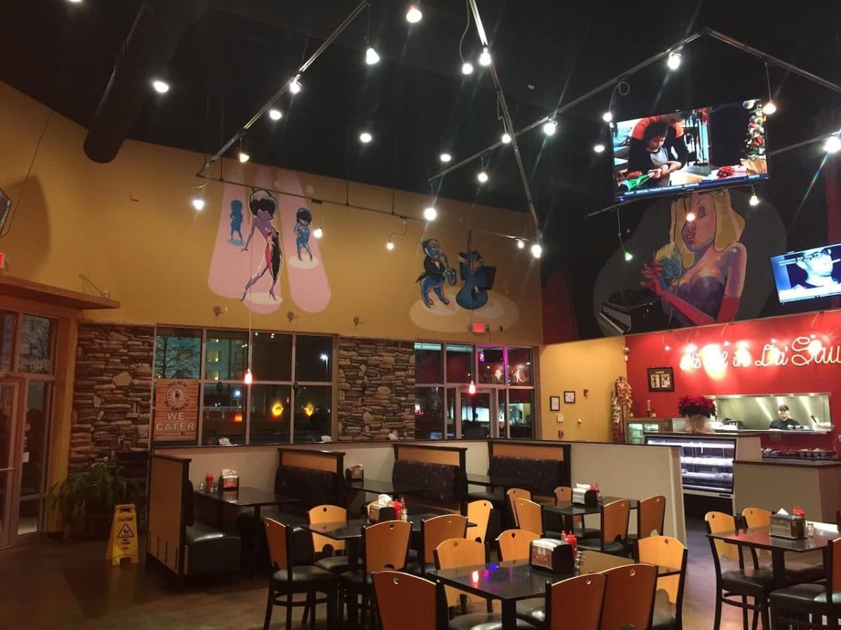 interior of restaurant with string lights