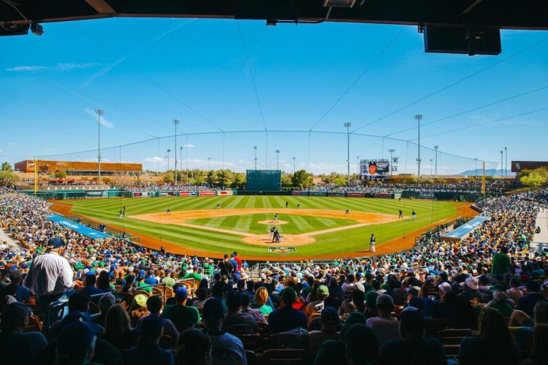 shot of baseball field from behind home plate looking out onto the field on sunny, blue sky day