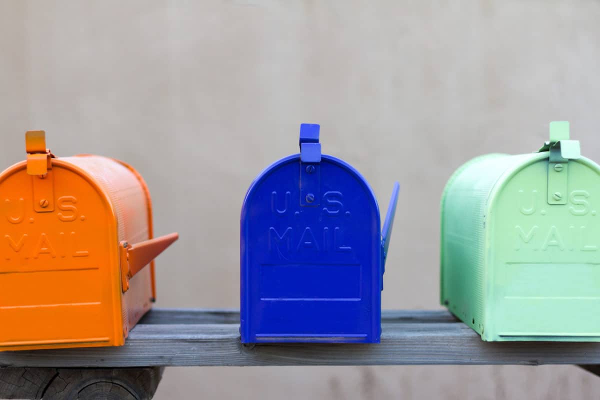 three colorful mailboxes