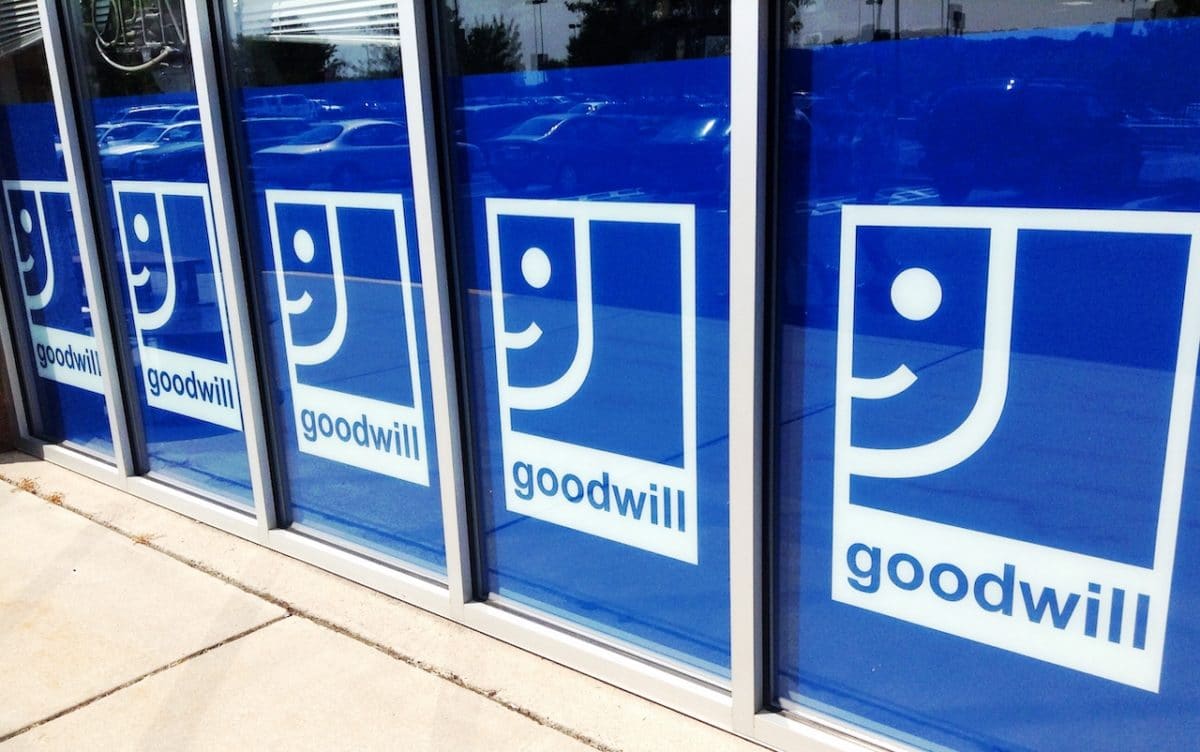 close up of goodwill sign in window