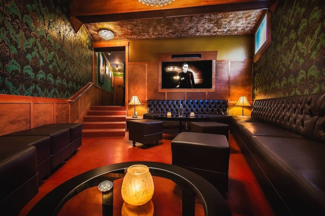empty interior of bar and lounge with candles on tables