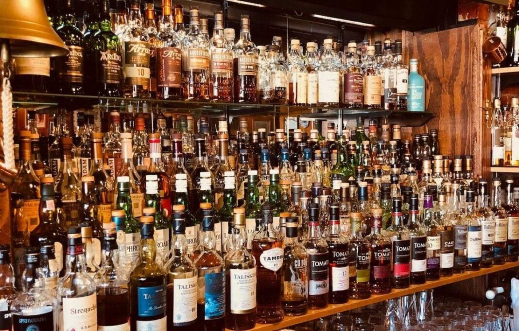 wall of scotch and whiskey at merlins