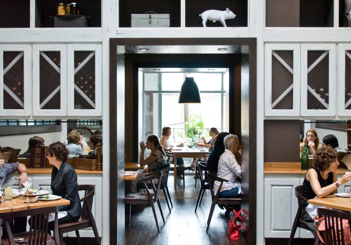 looking into doorway of restaurant that connects two dining rooms at miller union 