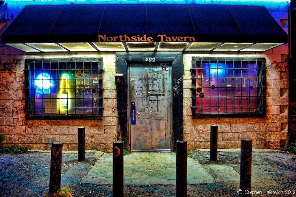 exterior of dive bar with neon lights