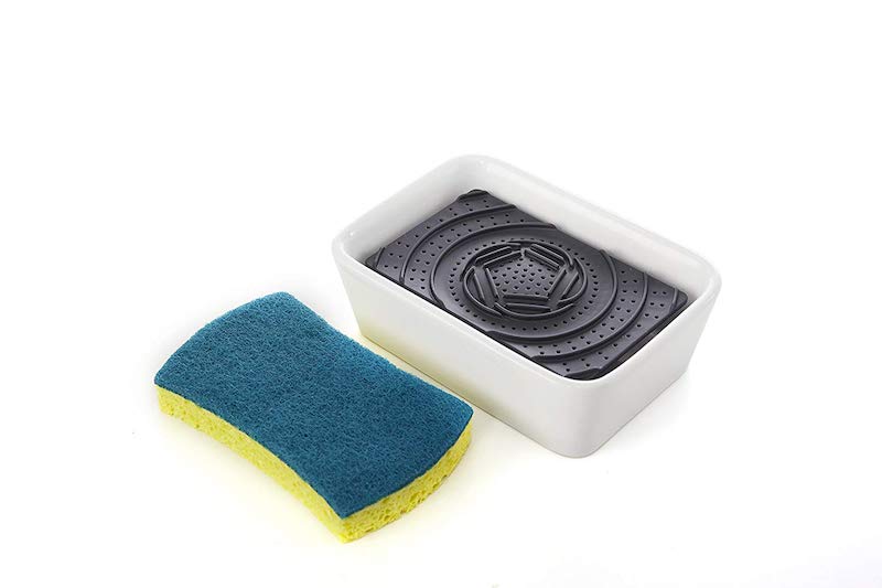 sponge next to holder with black piece in middle