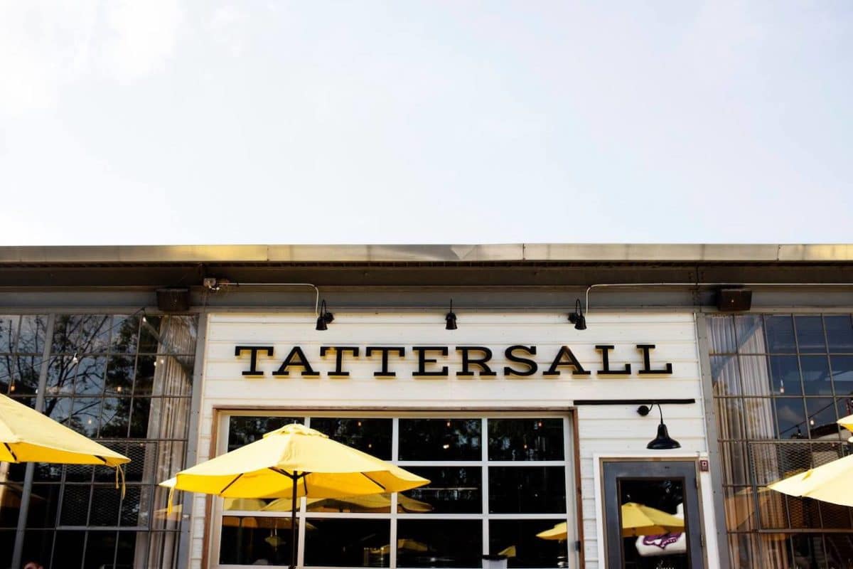 building reading tattersall with yellow umbrella  on a sunny day