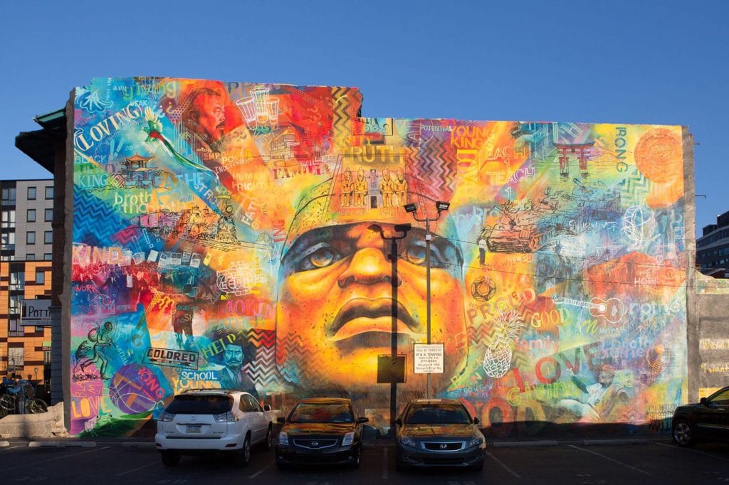 mural on building with blue sky in background