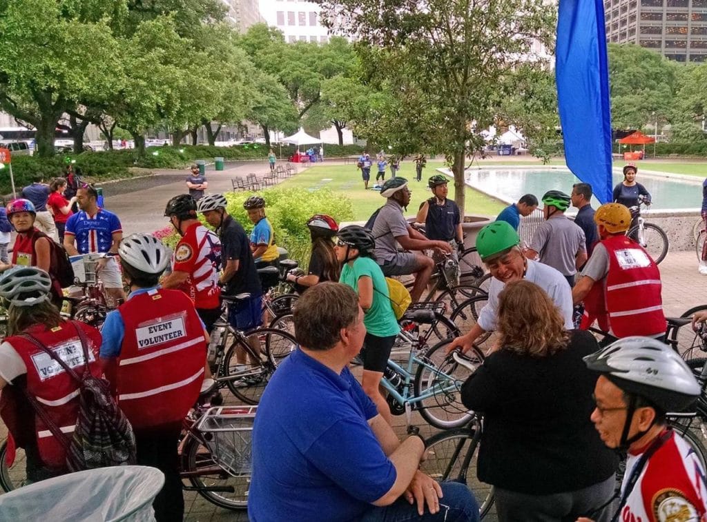 people gathered in houston with bikes