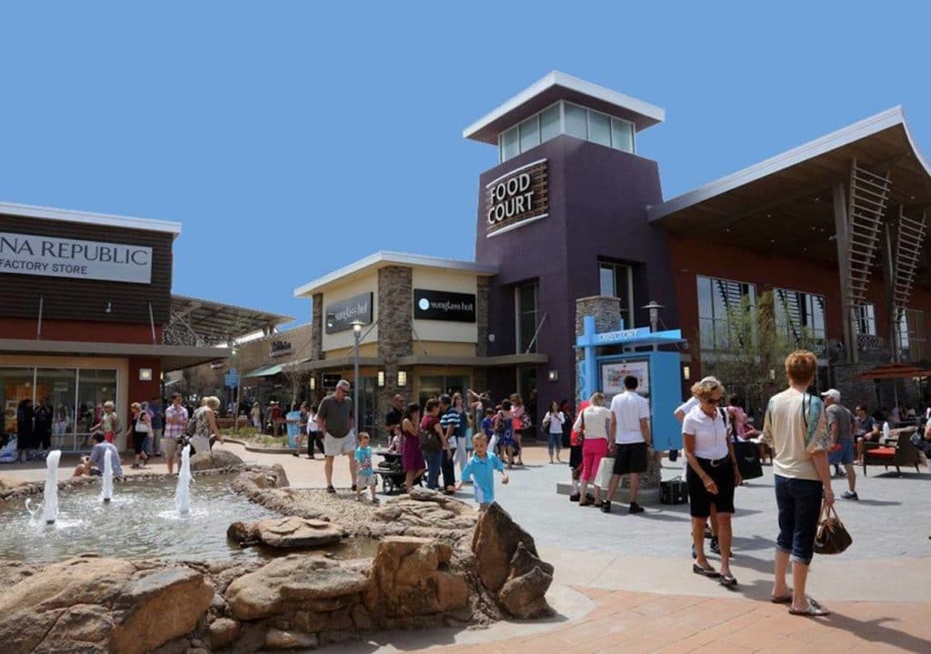 large, outdoor shopping mall on sunny day
