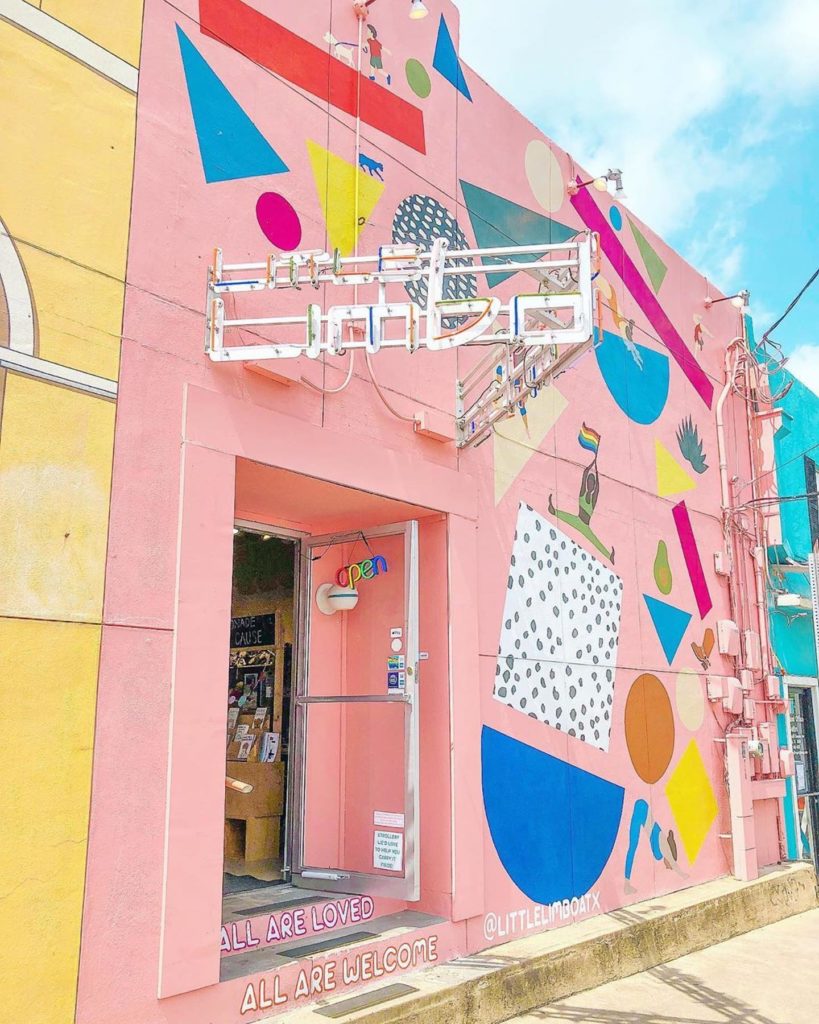 pink building with bright colors painted on it