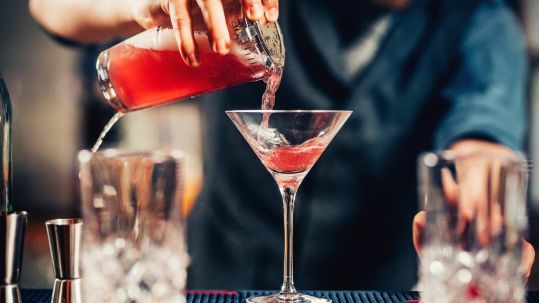 man making a cocktail 