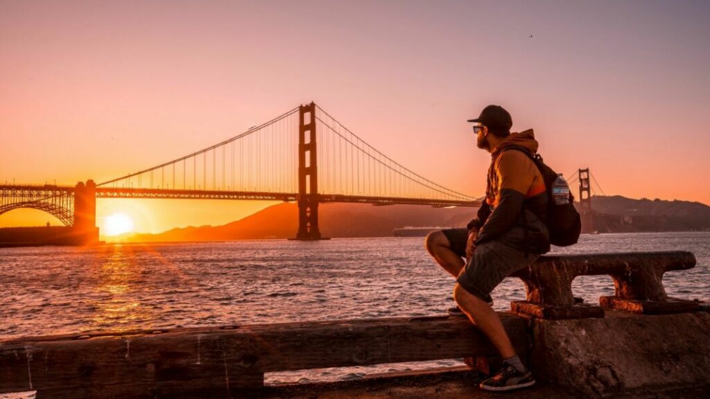 Man takes in the San Francisco sunset.