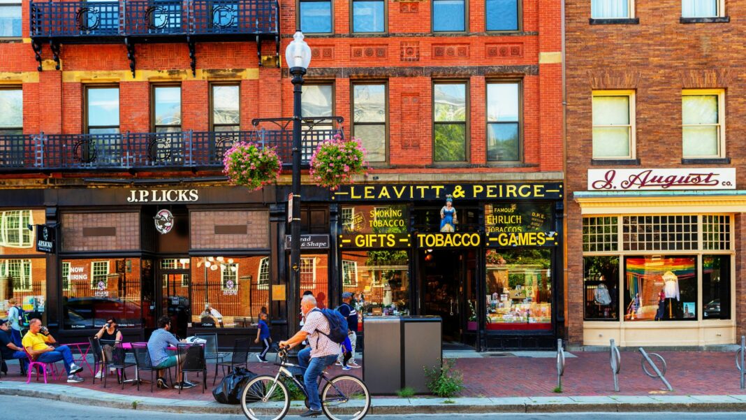Three retail store fronts on Massachusetts Avenue in Harvard Square, across from Harvard University's Harvard Yard campus.