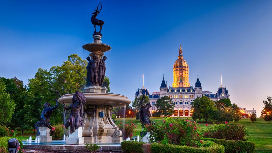 The Connecticut State Capitol building with the Corning Fountain in the foreground. The fountain was dedicated in 1899.