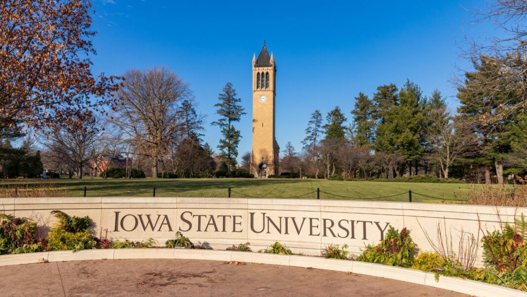 Iowa State University sign in front of the campanile.