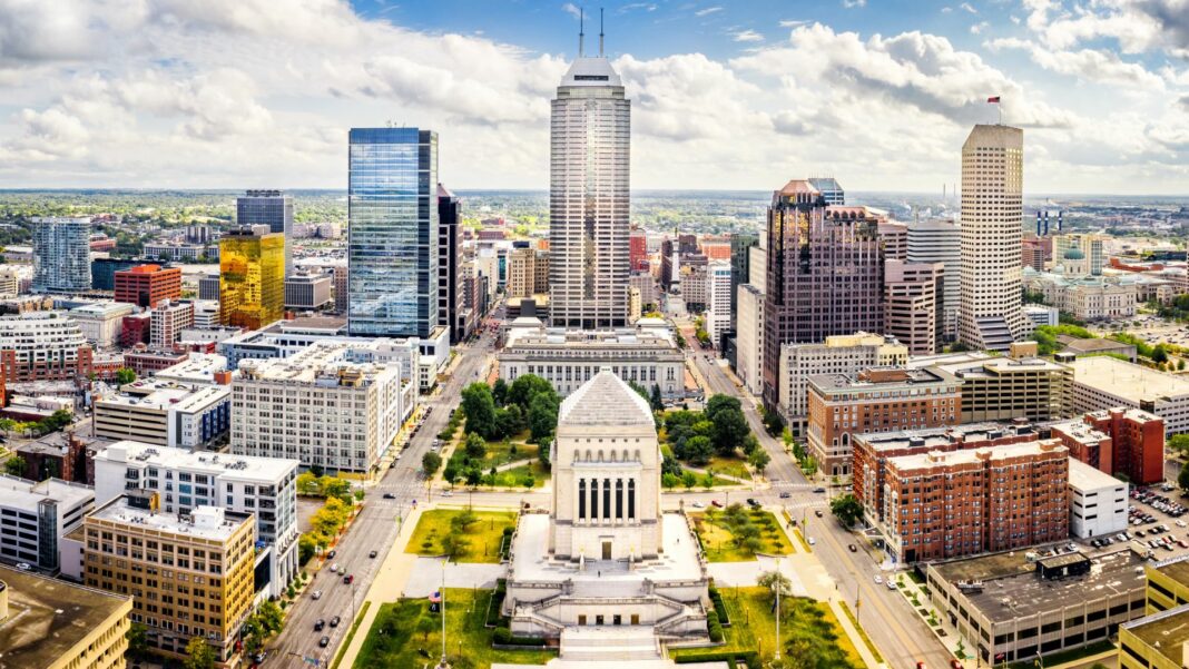 Aerial view of Indianapolis, Indiana skyline above Indiana World War Memorial and University park, and along Meridian and Pennsylvania streets.